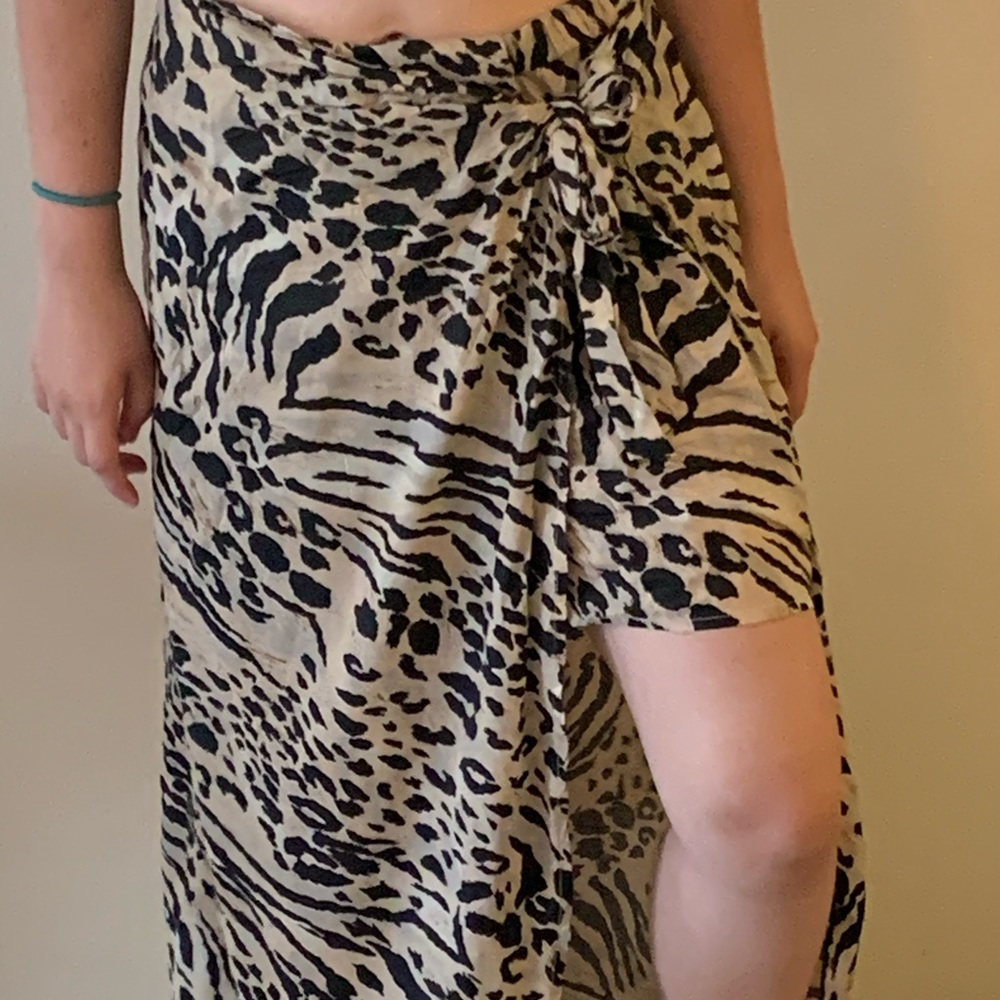 Do you see a leopard skirt or the first skirt?